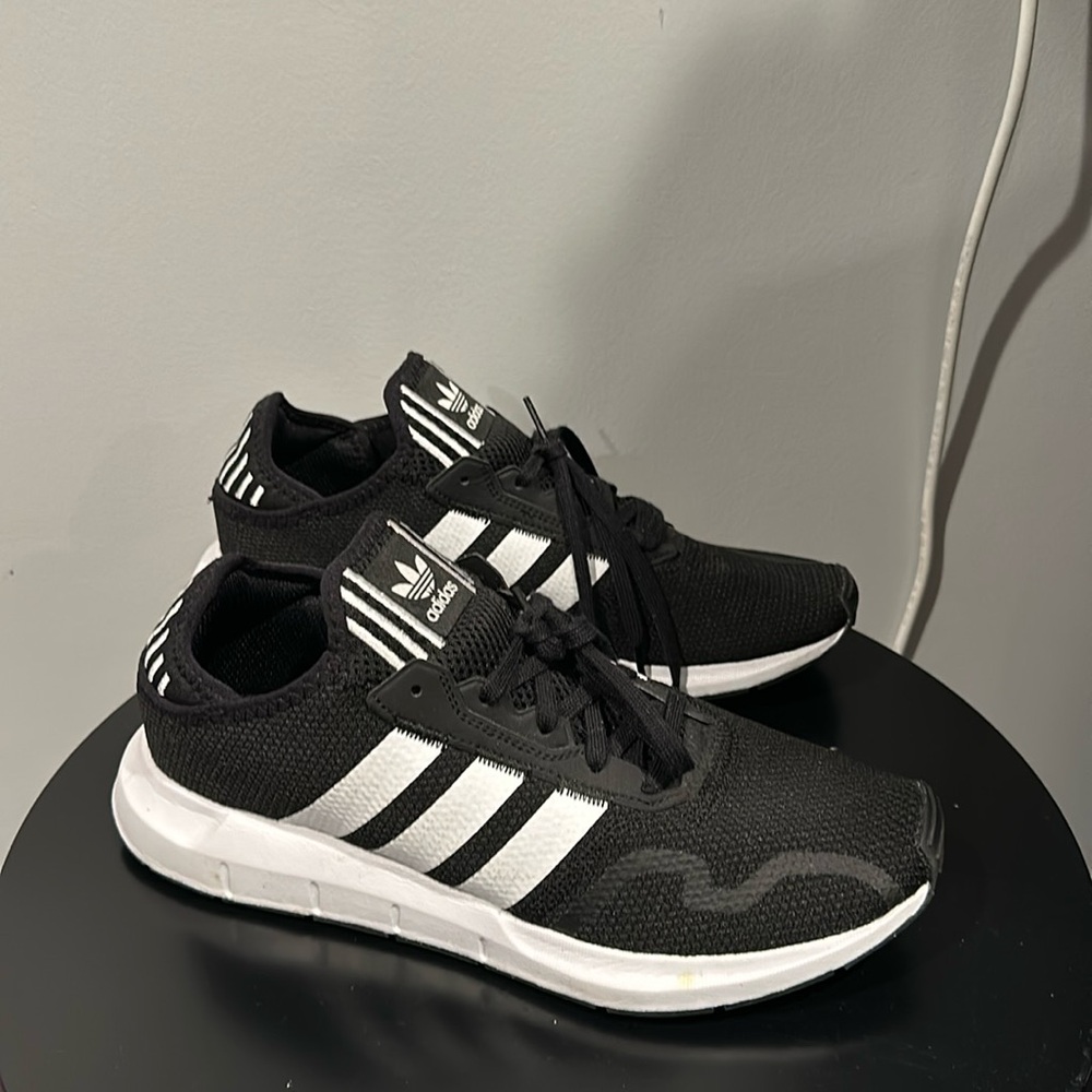 Adidas, tennis shoes worn a couple times